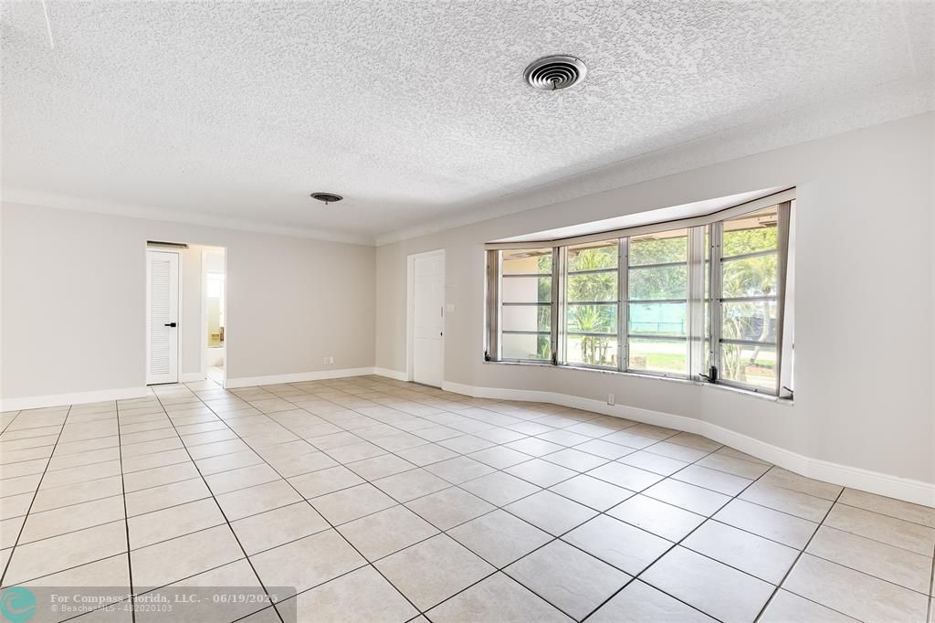 3460 Northeast 28th Avenue Lighthouse Point, FL 33064 - Photo 4 of 37 a view of an empty room and window