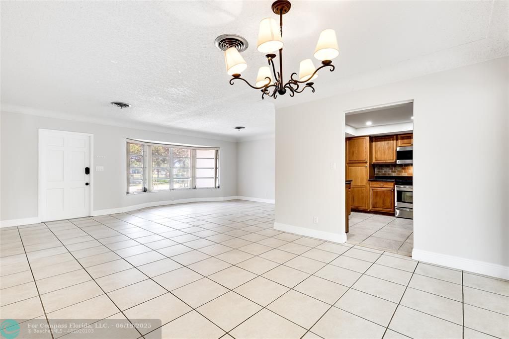 3460 Northeast 28th Avenue Lighthouse Point, FL 33064 - Photo 7 of 37 a view of an empty room with a window