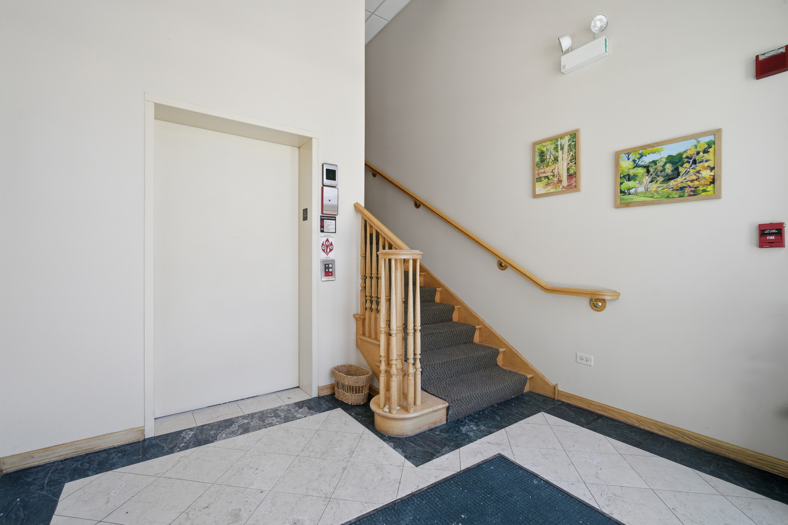 115 North Clifton Avenue, Unit 103 Park Ridge, IL 60068 - Photo 3 of 27 a view of entryway with wooden floor