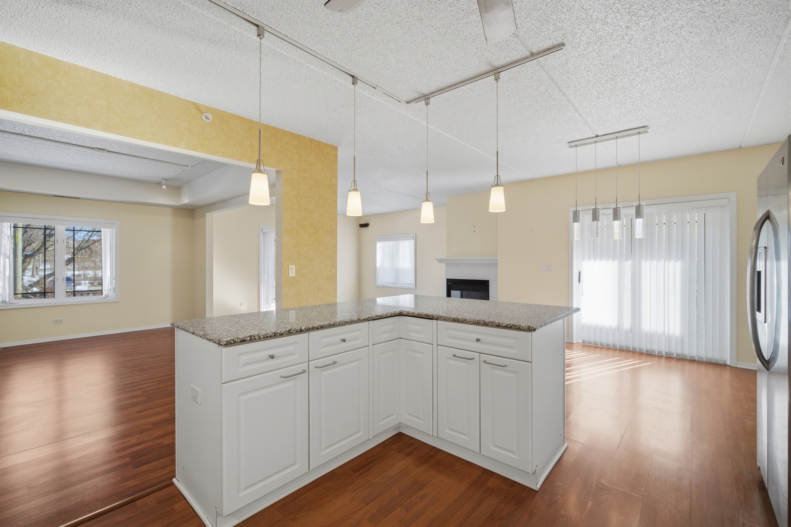 115 North Clifton Avenue, Unit 103 Park Ridge, IL 60068 - Photo 6 of 27 a kitchen with a sink cabinets and wooden floor