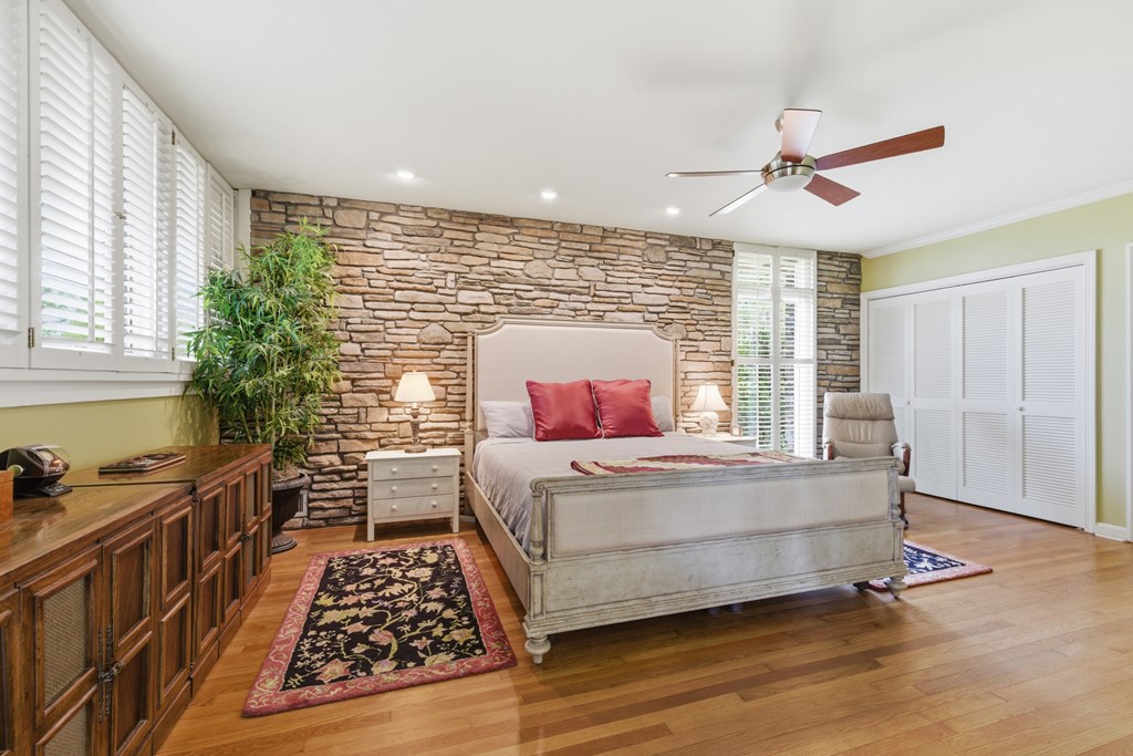 6203 Airport Road Andrews, NC 28901 - Photo 11 of 50 a bedroom with a bed and wooden floor