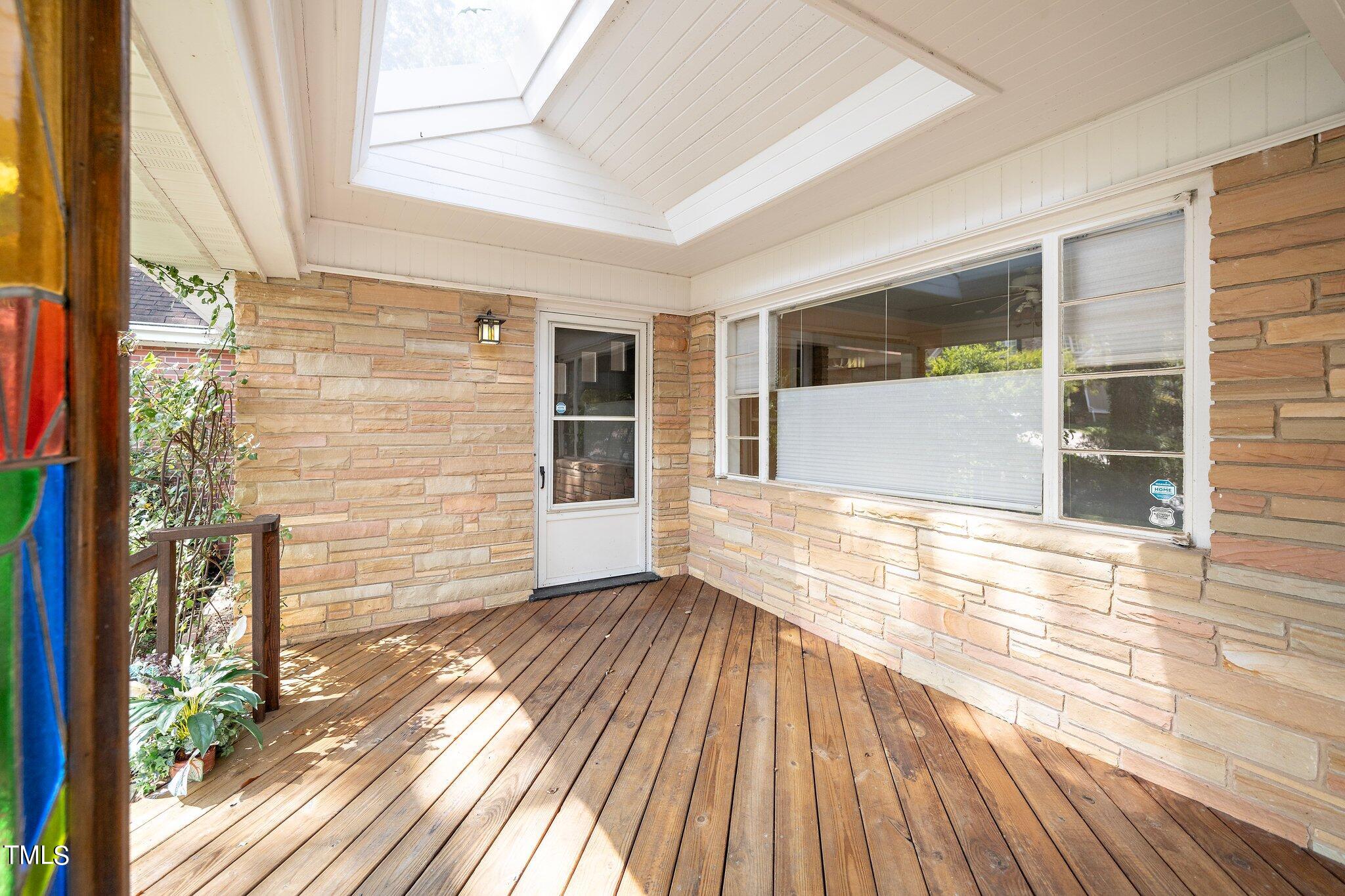 3236 Lewis Farm Road Raleigh, NC 27607 - Photo 9 of 10 sky light porch