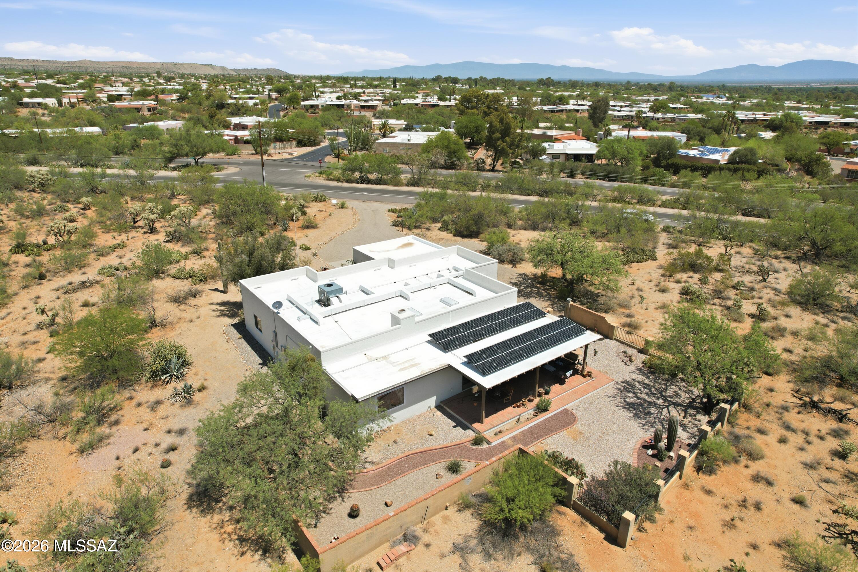 Arial view solar panels on back patio roof
