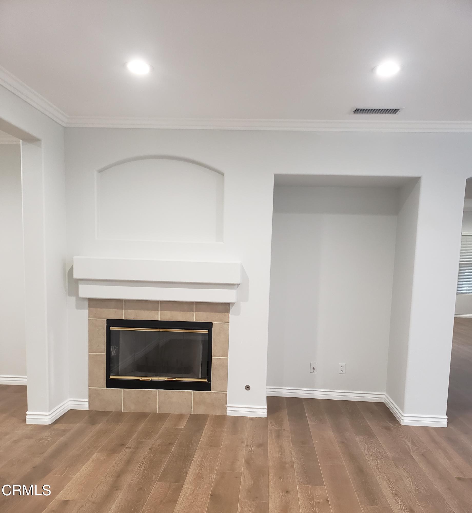 7454 Chanteclair Court Tujunga, CA 91042 - Photo 8 of 25 a view of empty room with a fireplace