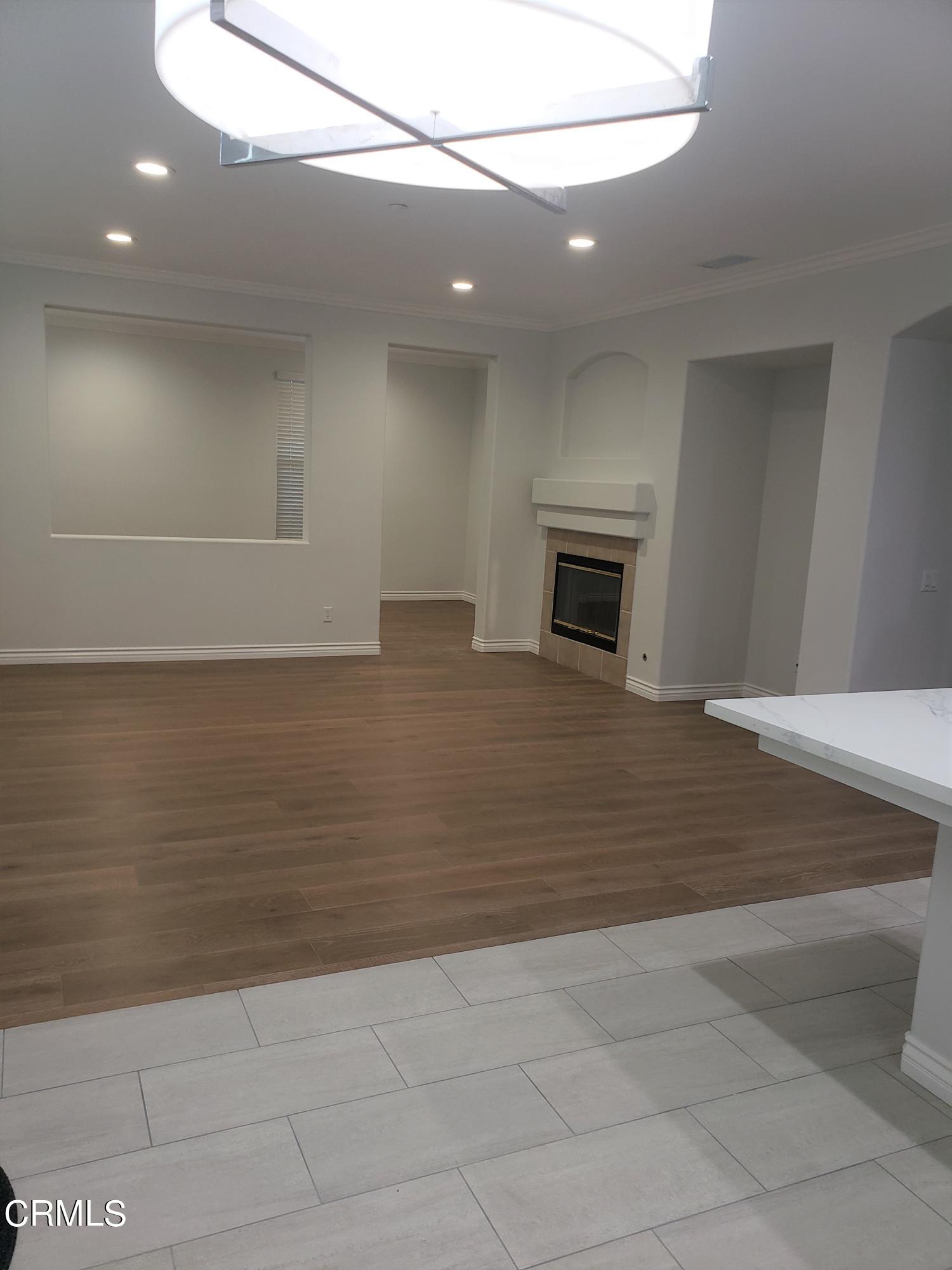 7454 Chanteclair Court Tujunga, CA 91042 - Photo 10 of 25 a view of a livingroom with a fireplace