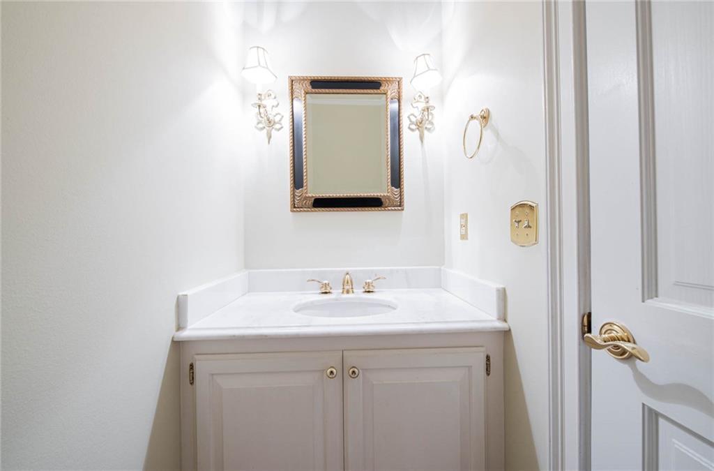 3184 Andrews Court Northwest Atlanta, GA 30305 - Photo 13 of 60 a bathroom with a sink and a mirror