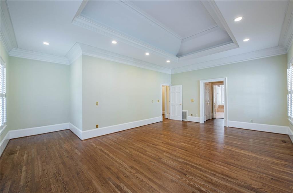 3184 Andrews Court Northwest Atlanta, GA 30305 - Photo 19 of 60 an empty room with wooden floor and closet