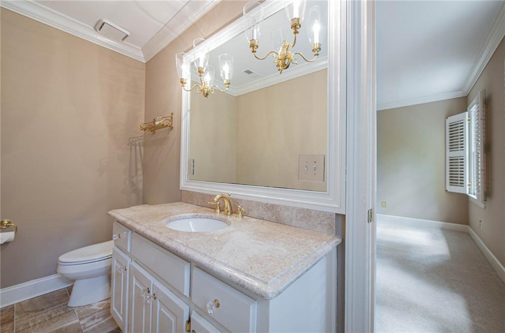 3184 Andrews Court Northwest Atlanta, GA 30305 - Photo 26 of 60 a bathroom with a sink toilet and shower
