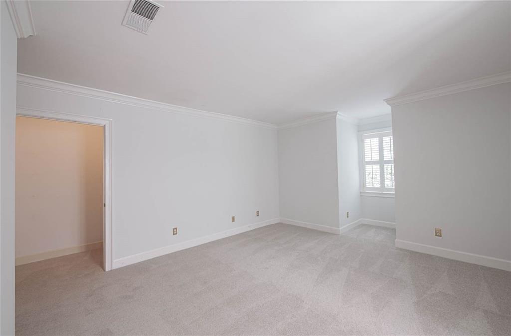 3184 Andrews Court Northwest Atlanta, GA 30305 - Photo 27 of 60 an empty room with windows