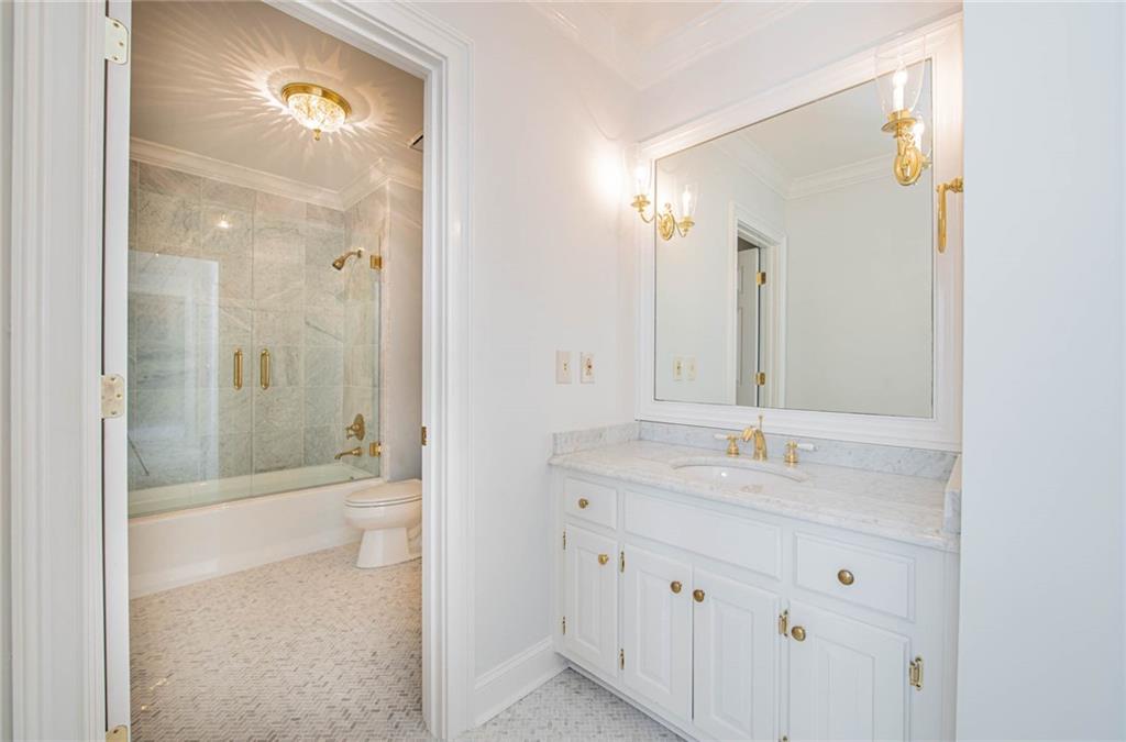 3184 Andrews Court Northwest Atlanta, GA 30305 - Photo 29 of 60 a bathroom with a sink a toilet and shower