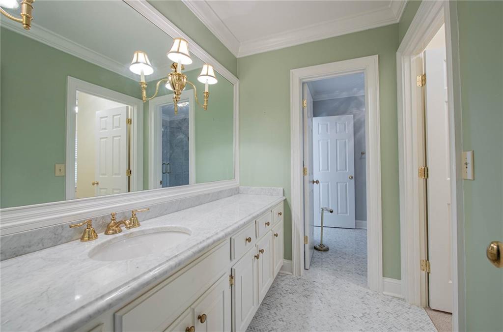 3184 Andrews Court Northwest Atlanta, GA 30305 - Photo 33 of 60 a bathroom with a granite countertop sink mirror and double