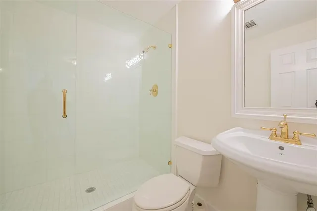 a room with pool table and windows