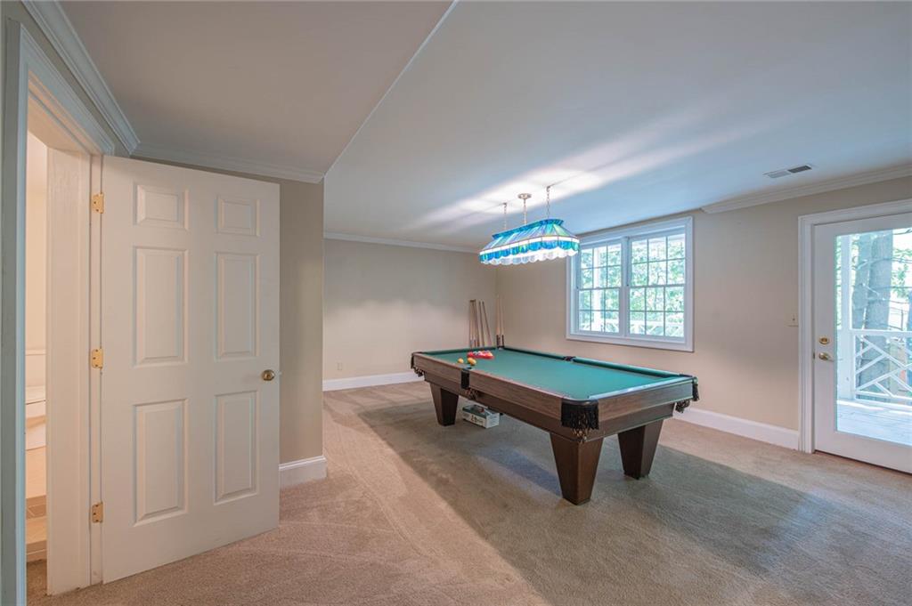 3184 Andrews Court Northwest Atlanta, GA 30305 - Photo 45 of 60 a room with pool table and windows