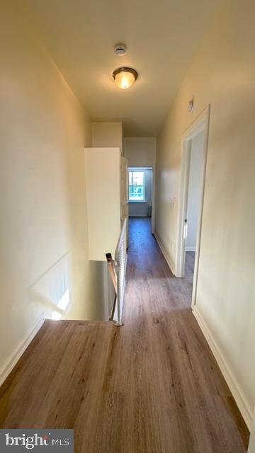 231 3rd Street Gloucester City, NJ 08030 - Photo 12 of 23 wooden floor in an empty room with a window