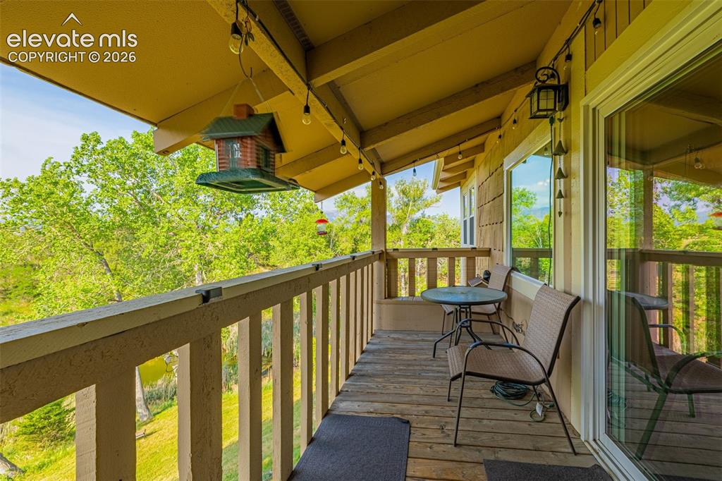 1658 Deer Creek Road Monument, CO 80132 - Photo 17 of 21 Spacious balcony looking over Lake Woodmoor