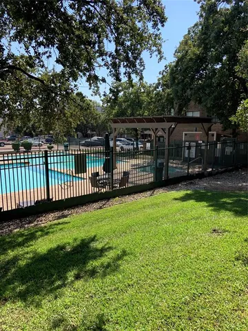 a view of a backyard with a garden