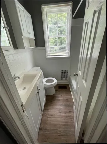 a view of a bathroom with a sink and a toilet