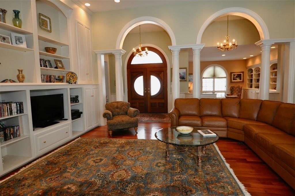 20 Muirfield Road Cumberland Center, ME 04021 - Photo 3 of 16 Dramatic columns and archways frame...