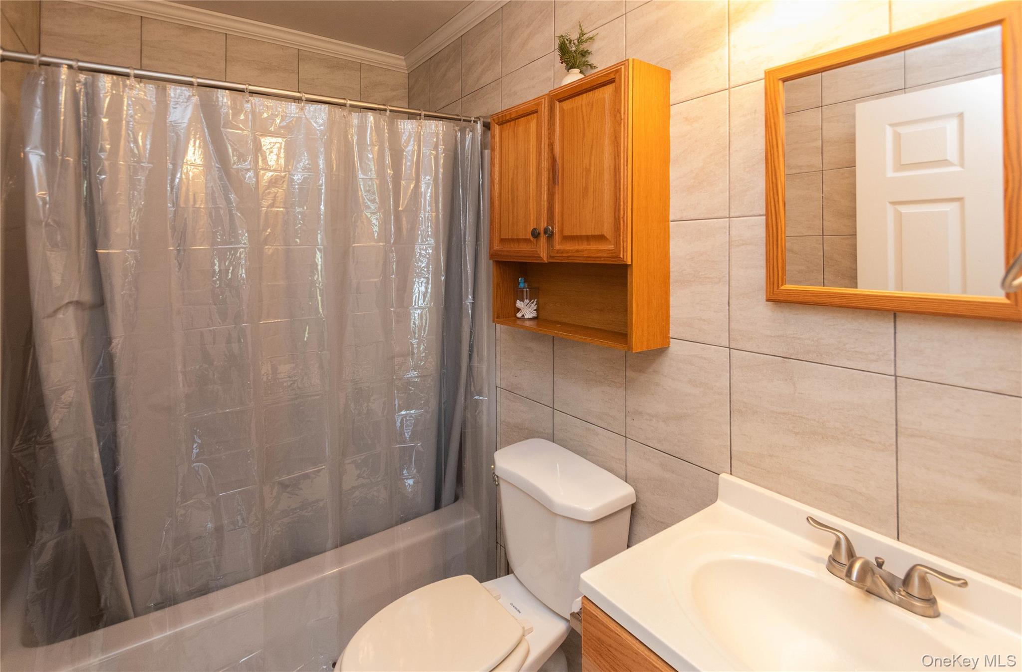 29 Murray Road Middletown, NY 10940 - Photo 12 of 24 a bathroom with a toilet a sink and shower