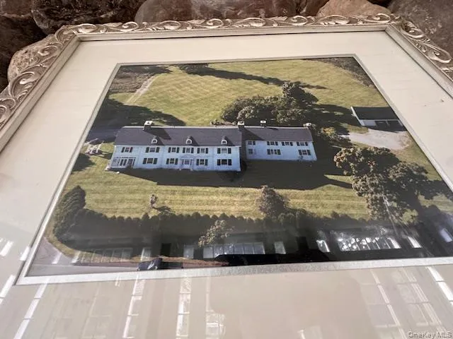 a view of swimming pool with a bench