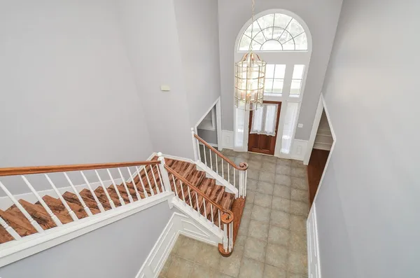 an entryway with staircase