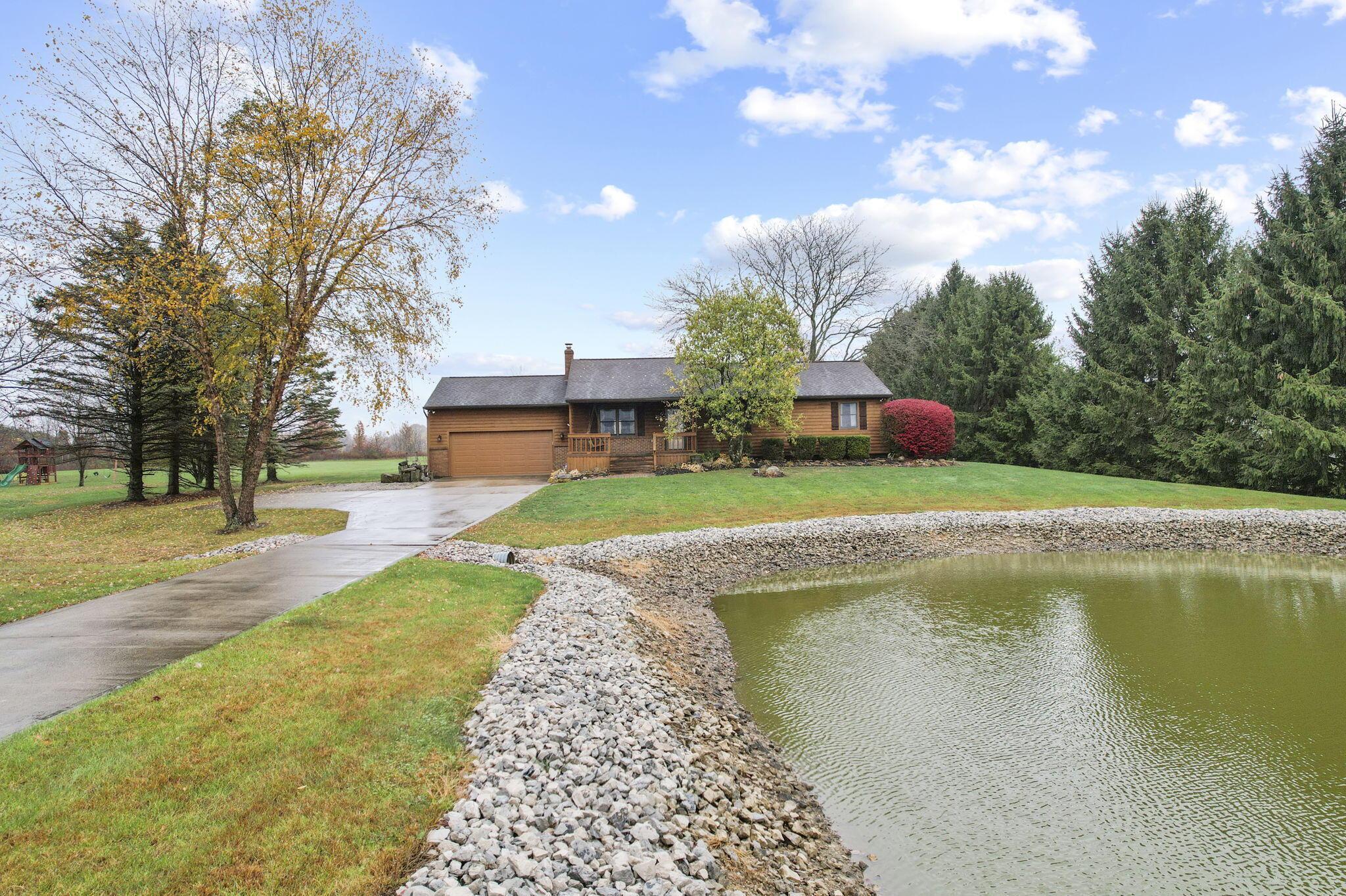 6283 York Road Southwest Pataskala, OH 43062 - Photo 31 of 45 Pond & concrete driveway