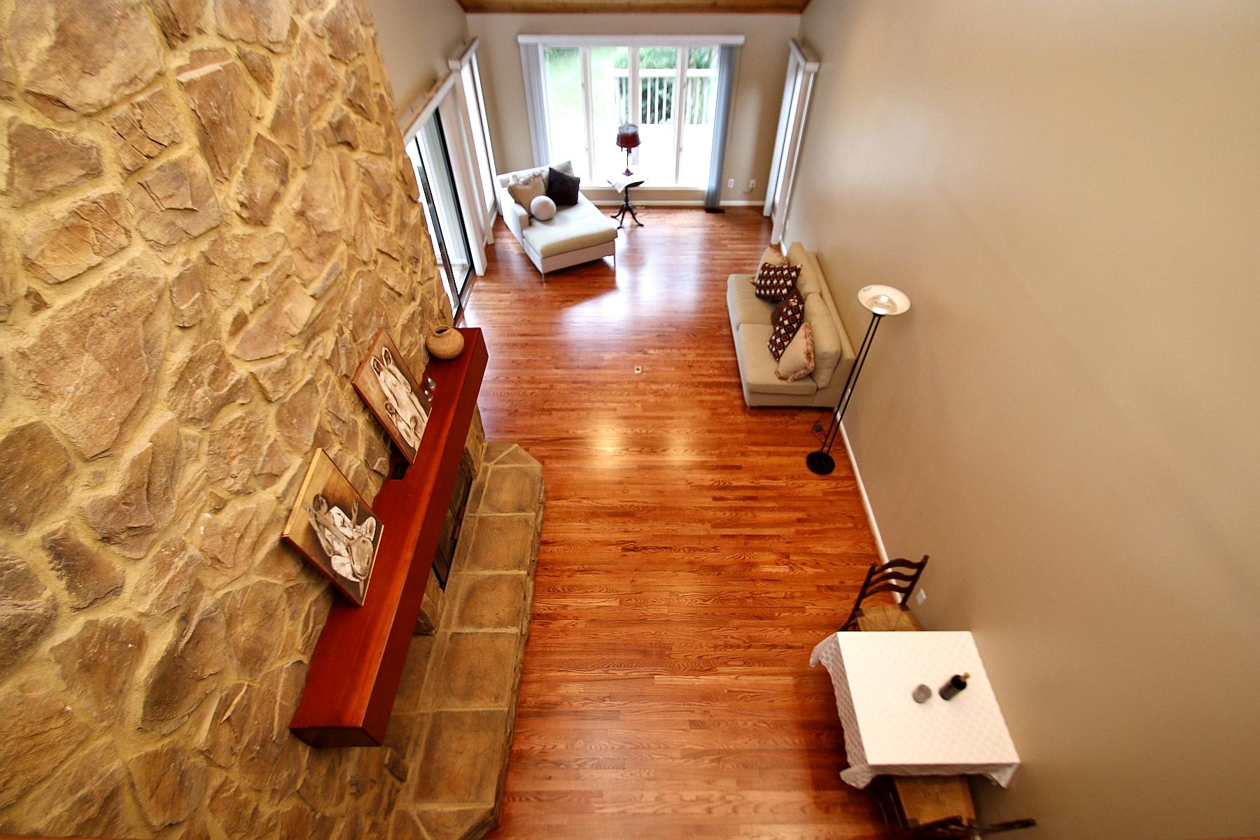 231 Stonebridge Drive Blue Ridge, VA 24064 - Photo 22 of 31 a living room with furniture and a wooden floor
