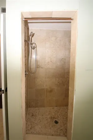a view of a bathroom from a hallway