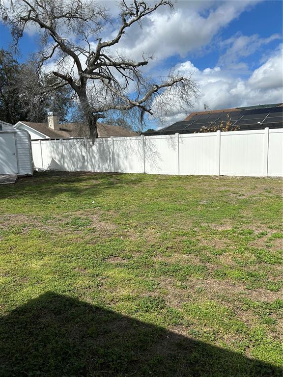 9297 Pickens Street Spring Hill, FL 34608 - Photo 3 of 40 a view of a water fountain and an outdoor space