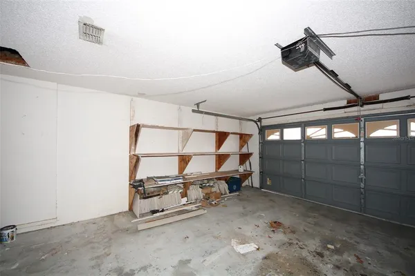 a kitchen with a stove and a sink