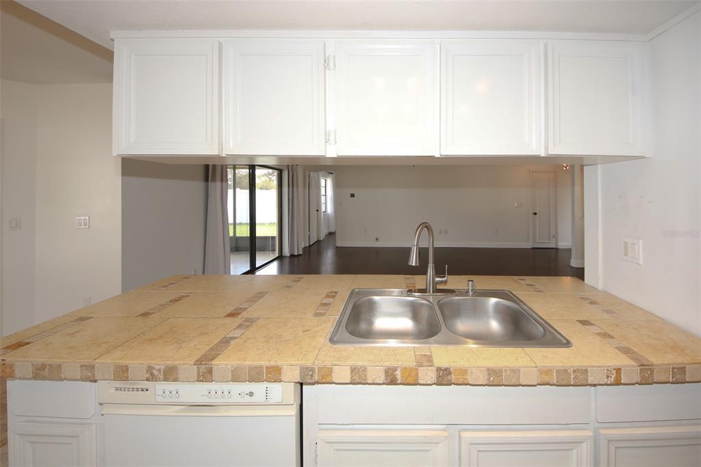9297 Pickens Street Spring Hill, FL 34608 - Photo 37 of 40 a bathroom with sink and window