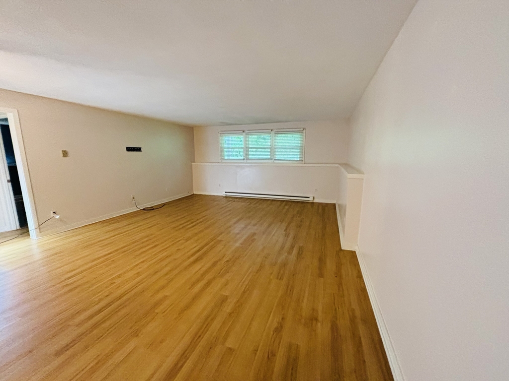 44 Evergreen Road, Unit 102 Leeds, MA 01053 - Photo 3 of 15 wooden floor in a room