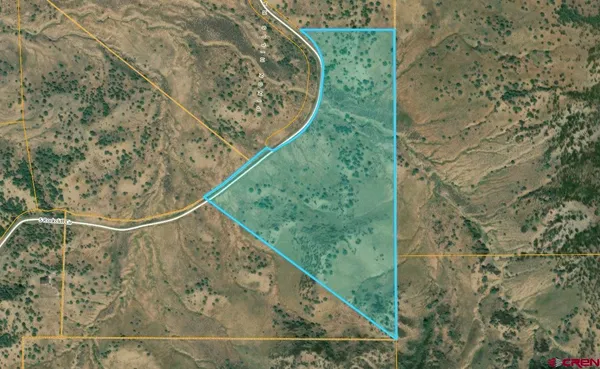 a view of a yard from a balcony