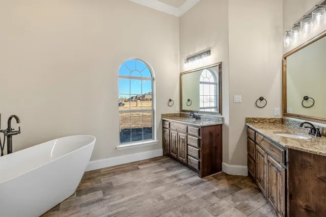 a view of a livingroom with a ceiling fan and window