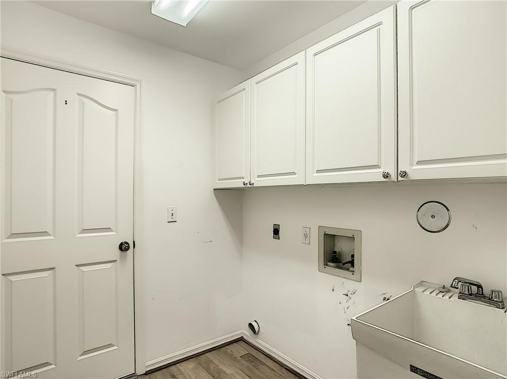 200 Napa Ridge Road East, Unit 6 Naples, FL 34119 - Photo 24 of 28 a view of a storage and utility room with closet