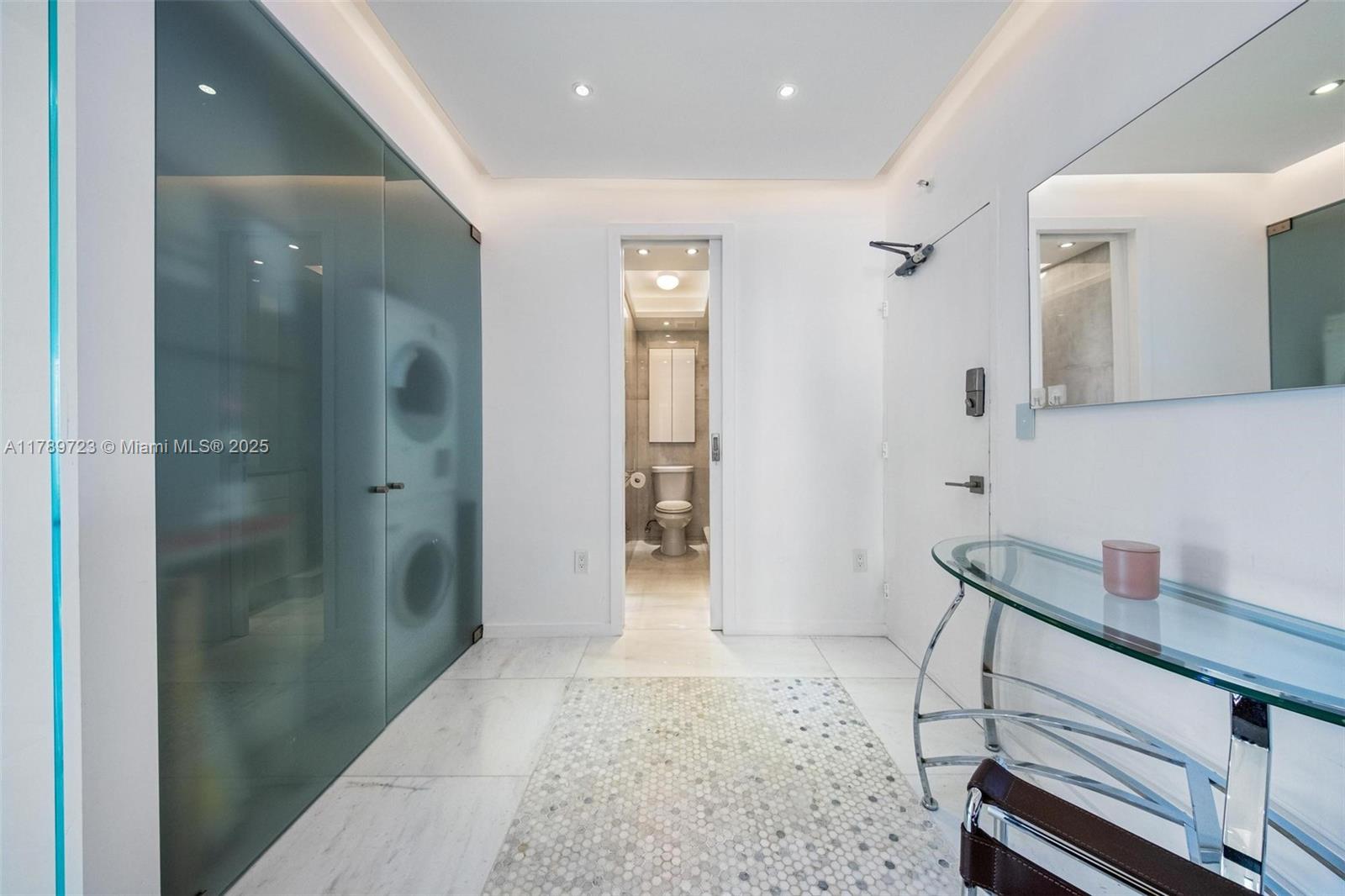 3 Island Avenue, Unit 3C Miami Beach, FL 33139 - Photo 12 of 73 a bathroom with a sink and a mirror