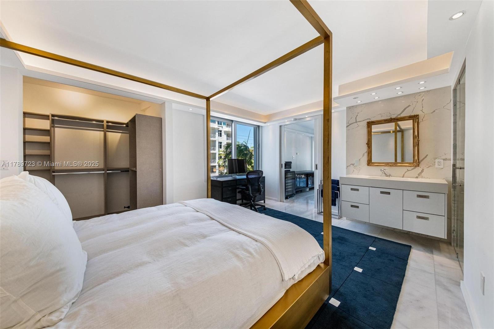 3 Island Avenue, Unit 3C Miami Beach, FL 33139 - Photo 16 of 73 a bedroom with a bed and a dresser