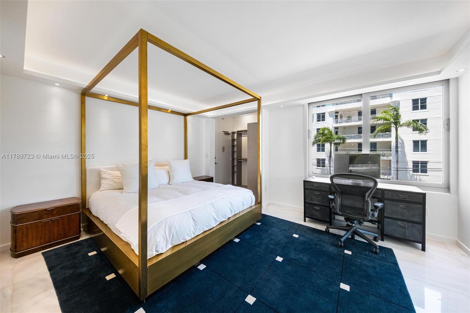 3 Island Avenue, Unit 3C Miami Beach, FL 33139 - Photo 21 of 73 a bedroom with a bed and a desk