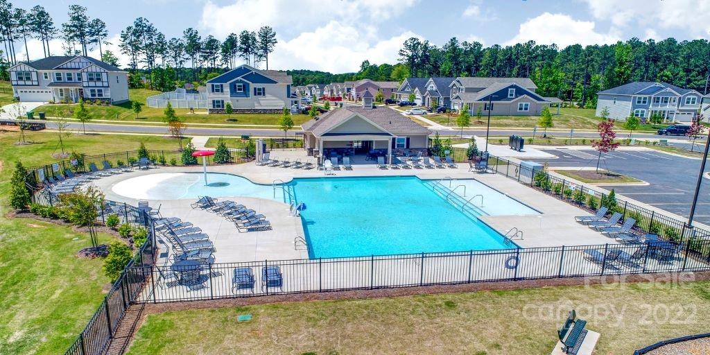 18821 Bankhead Road, Unit 303 Charlotte, NC 28278 - Photo 3 of 6 a swimming pool view with a outdoor seating