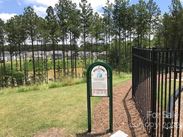 18821 Bankhead Road, Unit 303 Charlotte, NC 28278 - Photo 5 of 6 a view of swimming pool from a garden