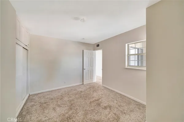 an empty room with window