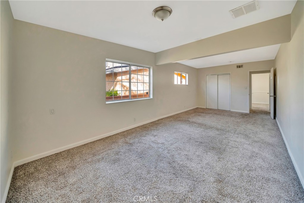 38453 3rd Street East Palmdale, CA 93550 - Photo 28 of 38 an empty room with windows