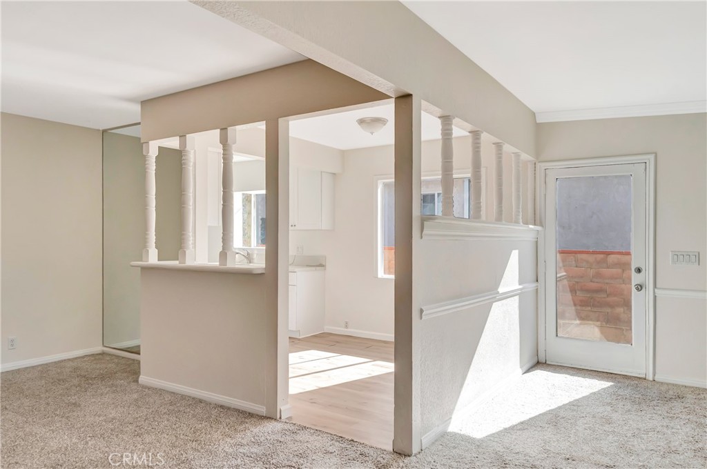 38453 3rd Street East Palmdale, CA 93550 - Photo 10 of 38 a view of entryway with wooden floor and door