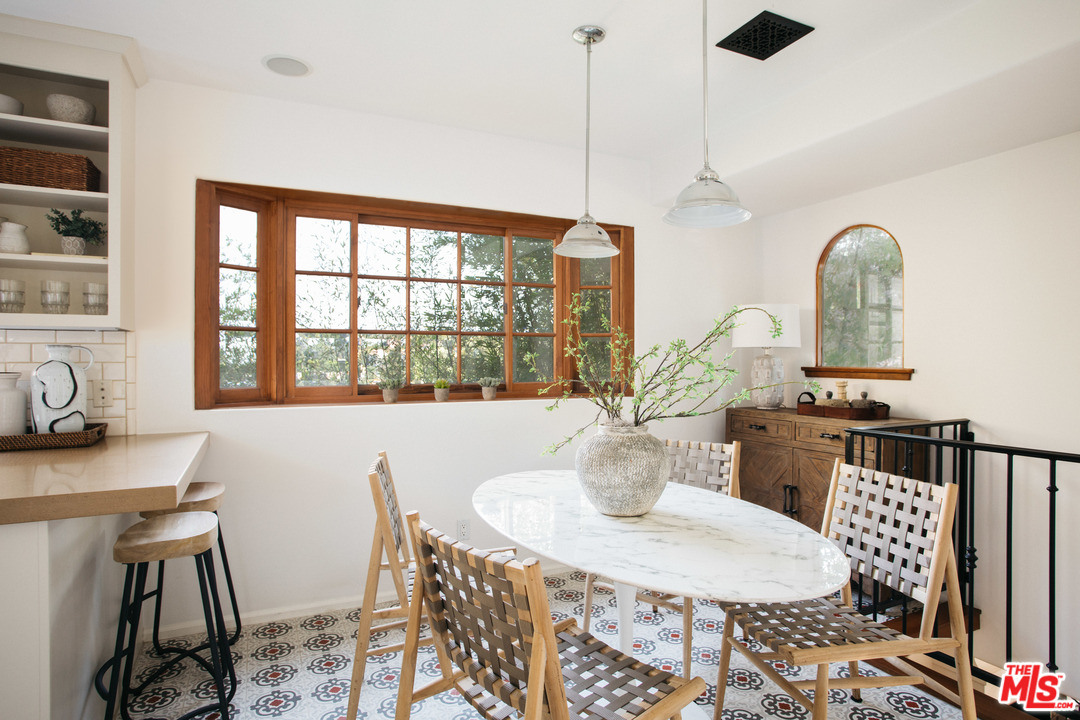 8515 Ridpath Drive Los Angeles, CA 90046 - Photo 11 of 20 a view of a dining room with furniture window and outside view