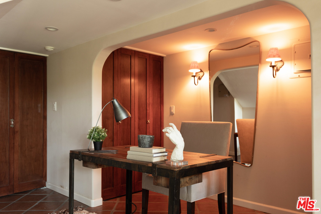 8515 Ridpath Drive Los Angeles, CA 90046 - Photo 10 of 20 a view of a dining room with furniture and wooden floor