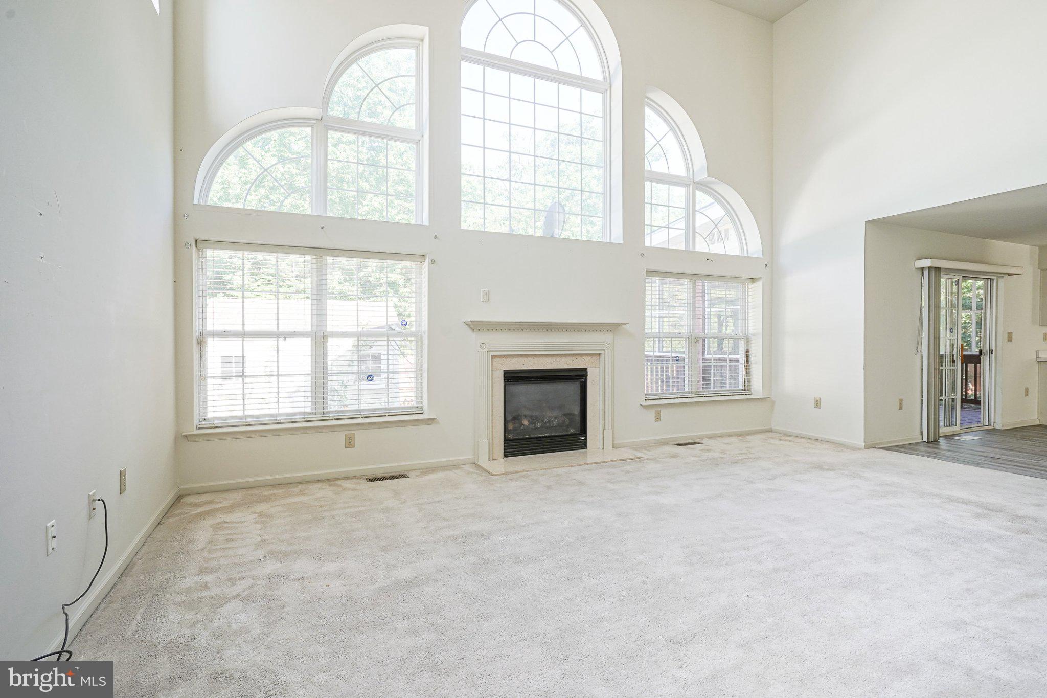 160 Quiet Road Sicklerville, NJ 08081 - Photo 9 of 24 Spacious living area with elegant windows.