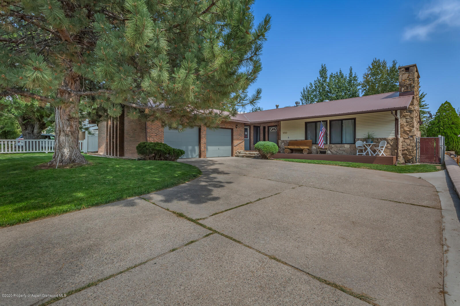 550 Aspen Avenue Rifle, CO 81650 - Photo 1 of 25 front view of house with a yard