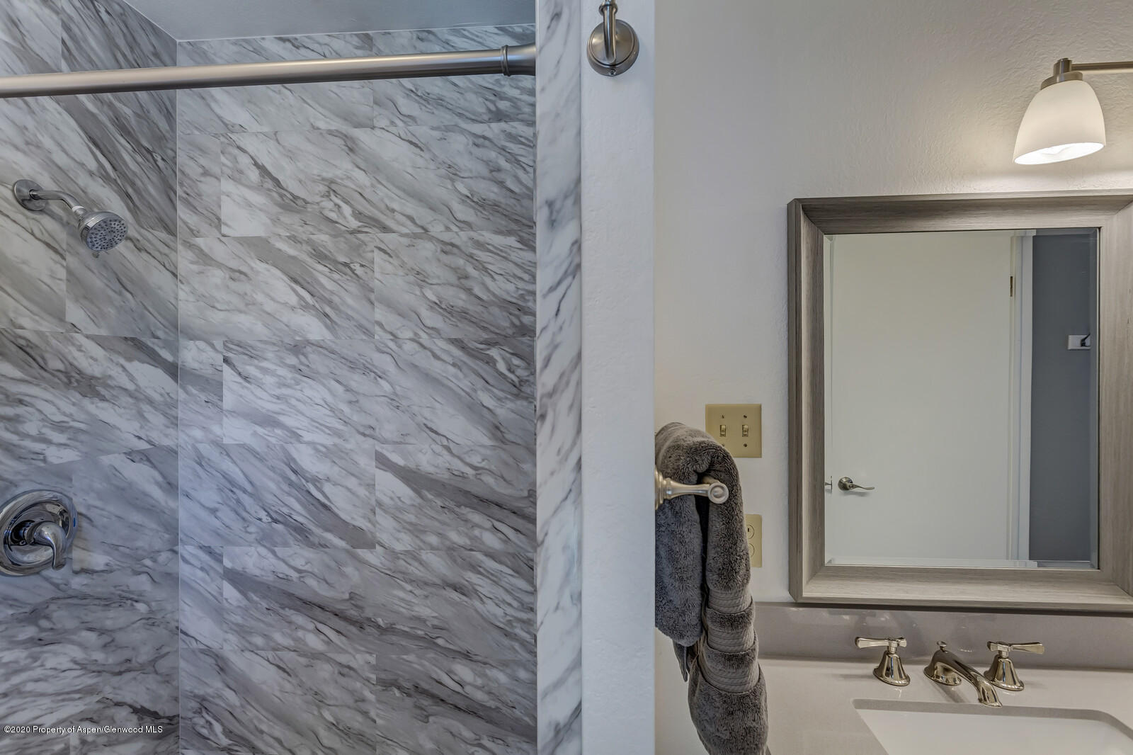550 Aspen Avenue Rifle, CO 81650 - Photo 17 of 25 a bathroom with a shower and a sink