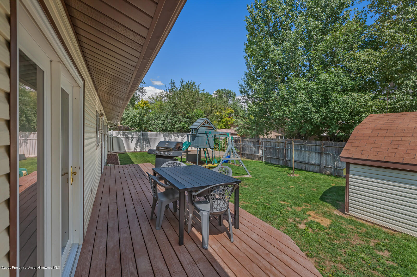 550 Aspen Avenue Rifle, CO 81650 - Photo 22 of 25 a view of a chairs and table on the wooden deck