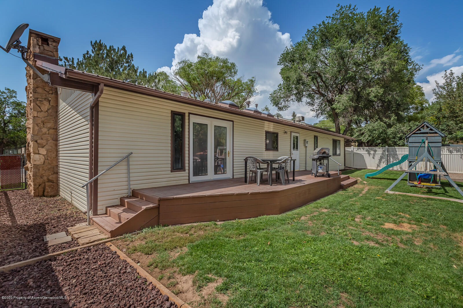 550 Aspen Avenue Rifle, CO 81650 - Photo 23 of 25 a view of a house with backyard and sitting area